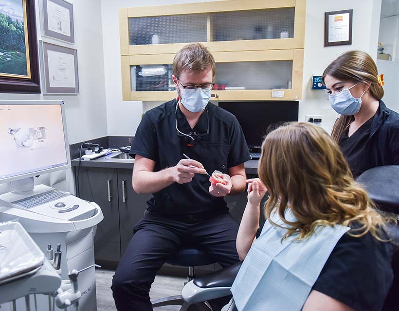 Dr. Keaton Colville with Patient | Core Dental | General & Family Dentist | Downtown Calgary